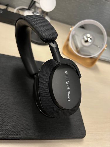 a black headphones on a desk