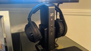 a black headphones on a black stand